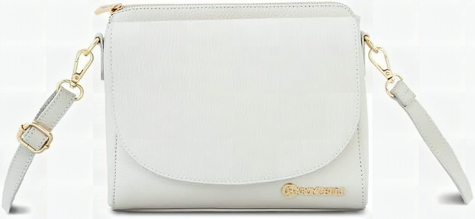Macro detail of Baroncelli crossbody bag leather strap and metal hardware in warm studio light